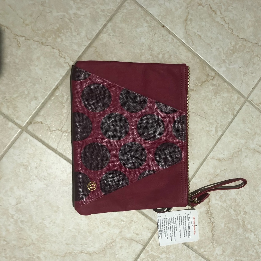 Maroon present pouch from lululemon.
